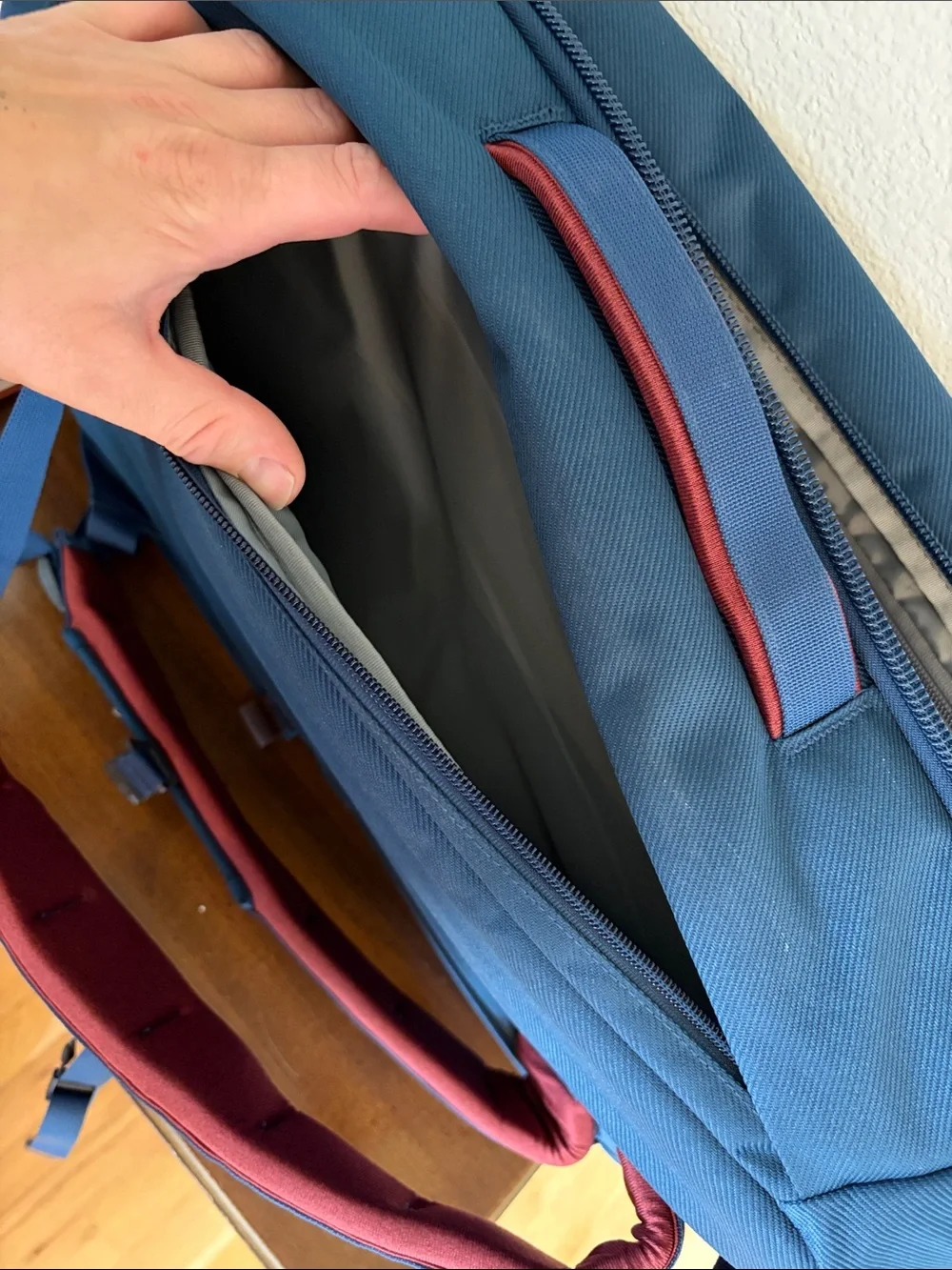 The North Face Travel Duffel Blue Backpack with Red Accents